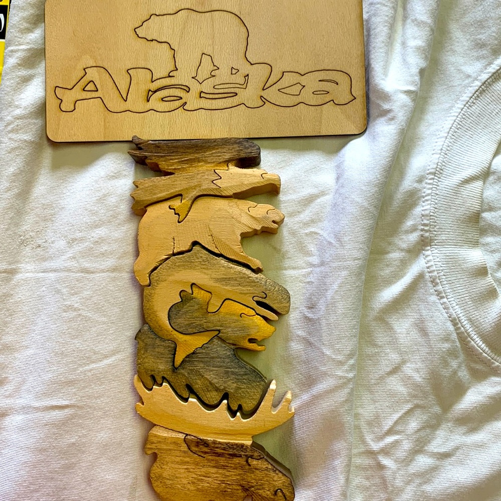 Alaskan carved animal puzzle
